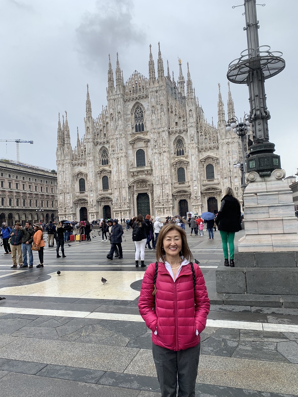 Dr. Chisa Yamada at Il Duomo, Milan, Italy on one of her many travels